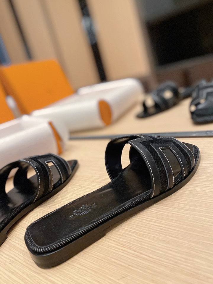HERMES 0RAN SANDALS IN BLACK CALFSKIN AND CANVAS