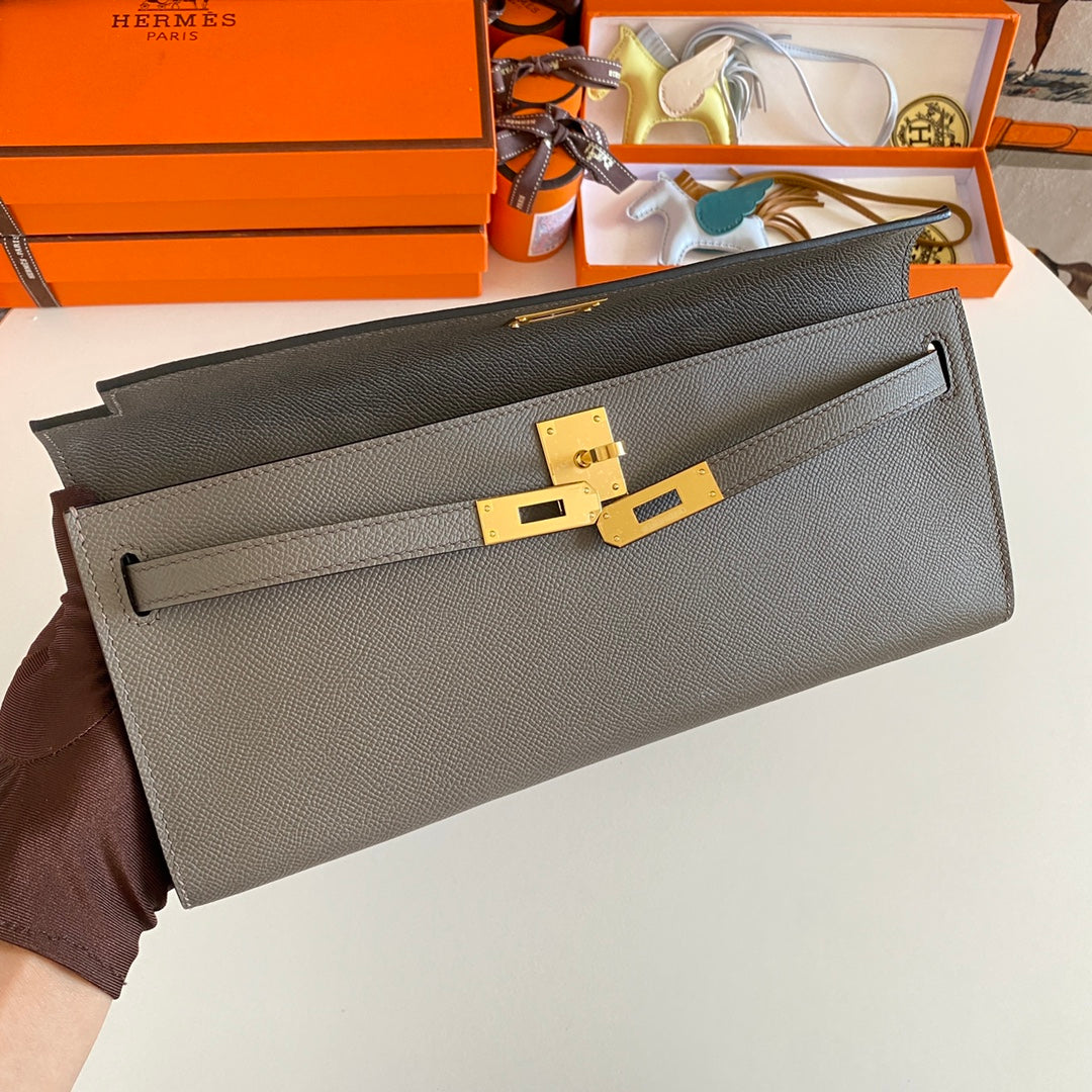 HERMES KELLY CUT 31 IN WOOD BROWN CALFSKIN WITH GOLD HARDWARE
