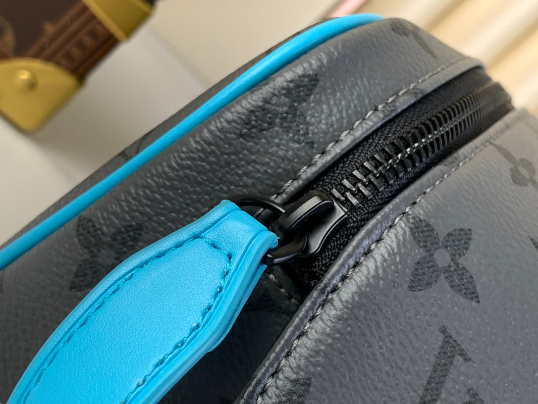 LOUIS VUITTON DOPP KIT 28 IN GUN METAL MONOGRAM ECLIPSE CANVAS AND TURQUOISE CALFSKIN TRIM