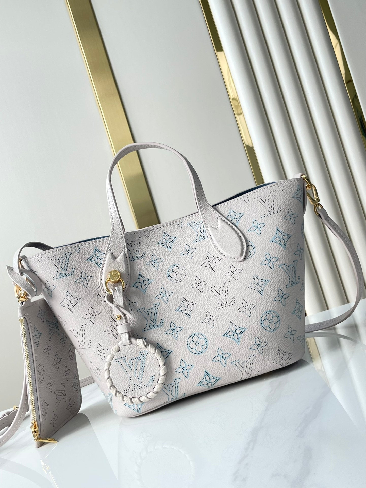 LOUIS VUITTON BLOSSOM PM 20 IN BLUME PERFORATED CALFSKIN
