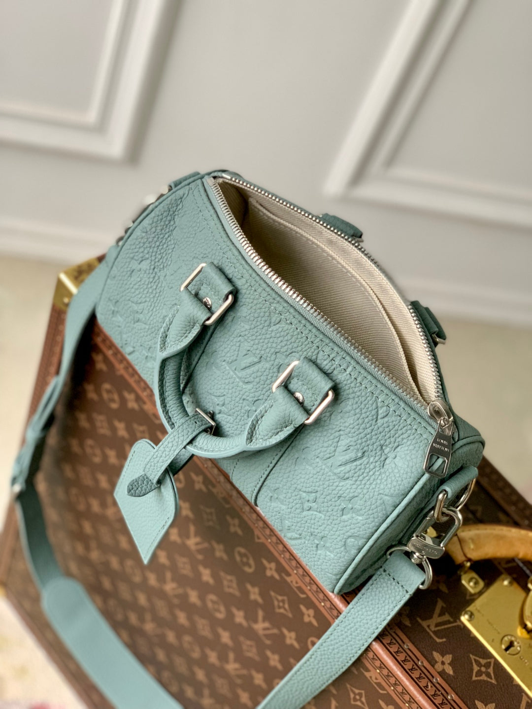 LOUIS VUITTON KEEPALL BANDOULIÈRE 25 BAG IN MISTY LAKE GREEN MONOGRAM TAURILLON CALFSKIN