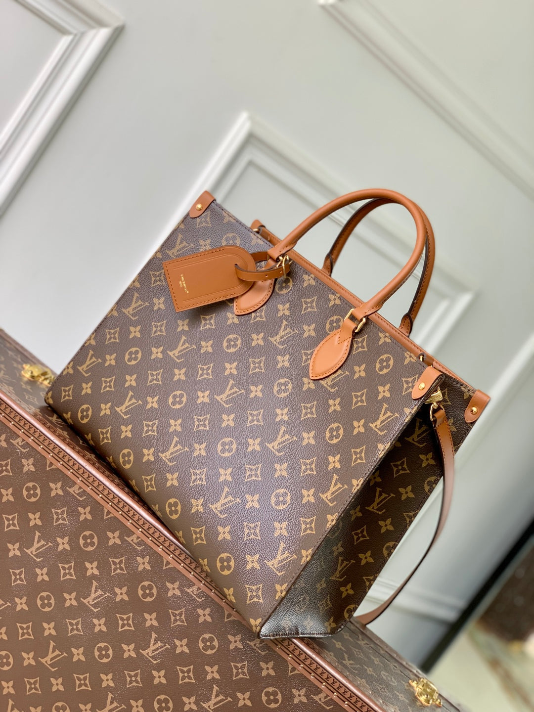 LOUIS VUITTON ONTHEGO ORGANIZER 37 IN BROWN COATED CANVAS AND CALFSKIN