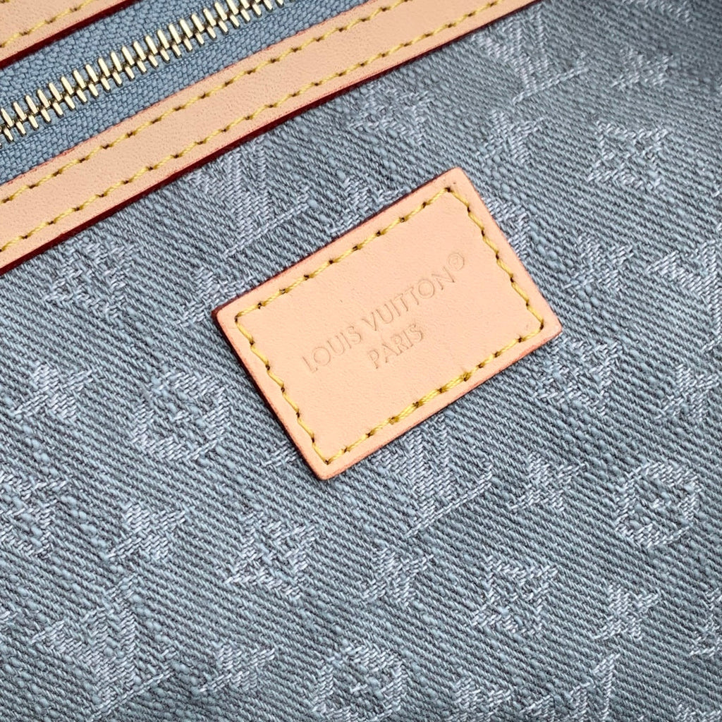 LOUIS VUITTON KEEPALL BANDOULIÈRE 45 IN GREY MONOGRAM DENIM LIGHT BROWN CALFSKIN