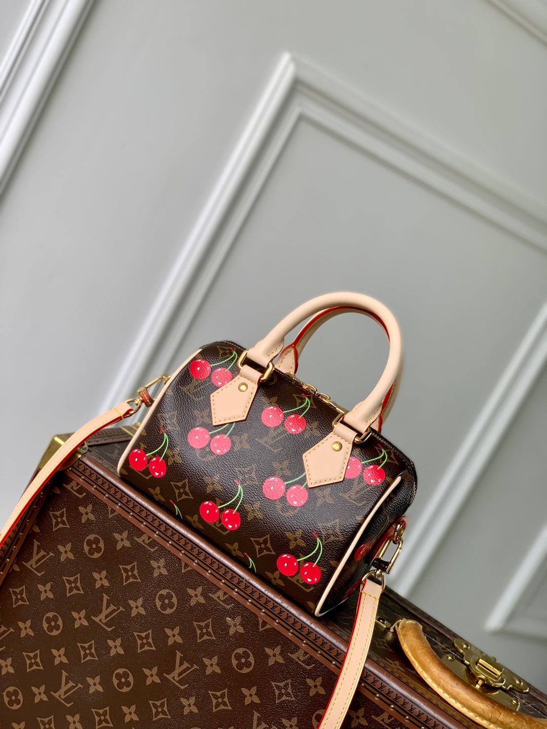 LOUIS VUITTON SPEEDY BANDOULIÈRE 20.5 BAG IN BROWN CANVAS CHERRY PRINTED