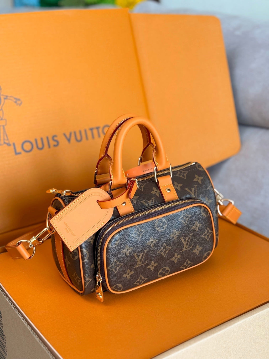 LOUIS VUITTON LV 25S KEEPALL CARGO 25 IN BROWN MONOGRAM CANVAS AND CALFSKIN GOLD HARDWARE