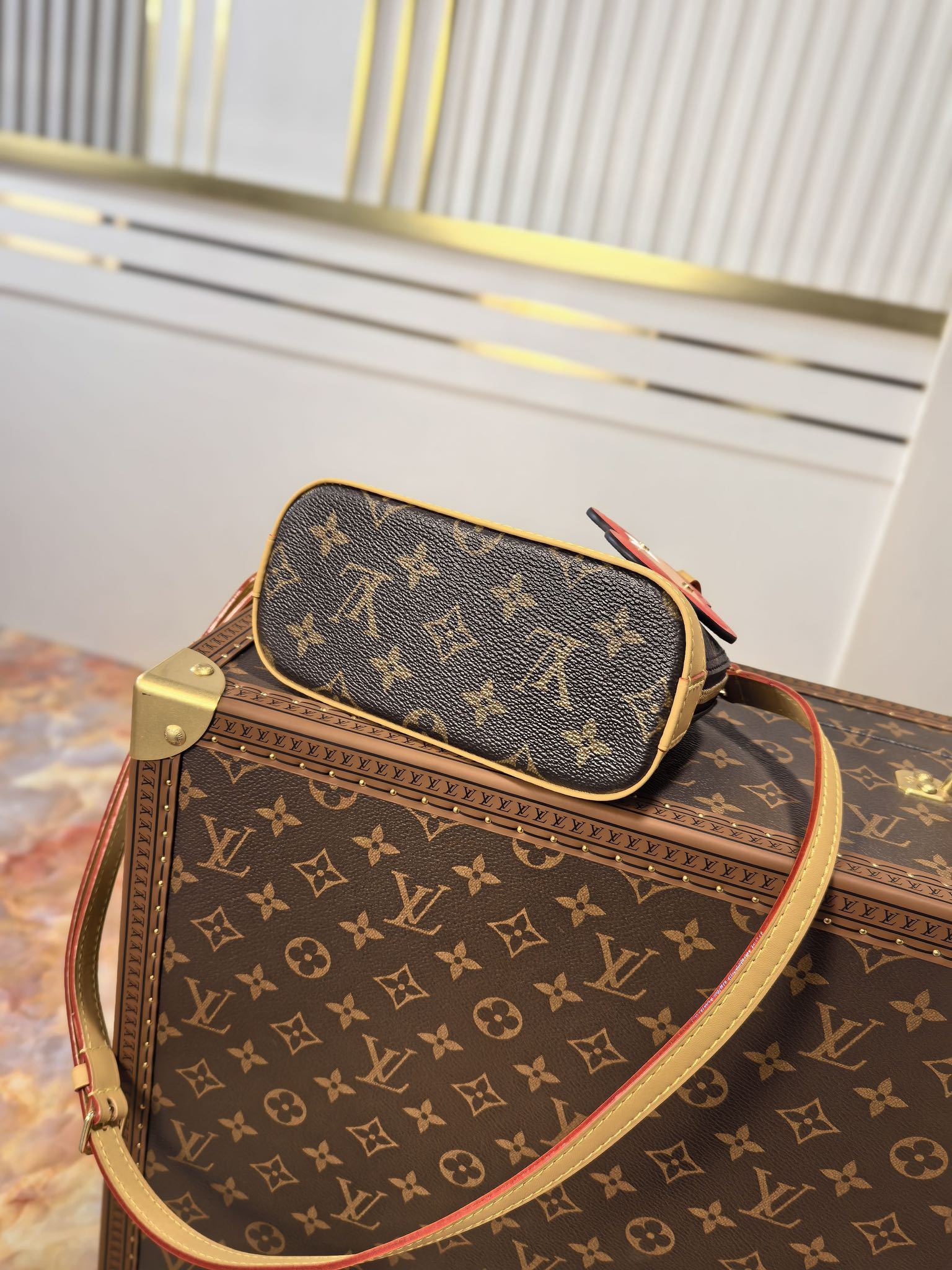 LOUIS VUITTON LV 25S NANO ALMA 18 IN BROWN MONOGRAM CANVAS PRINTED WITH THE VIVIENNE MASCOT