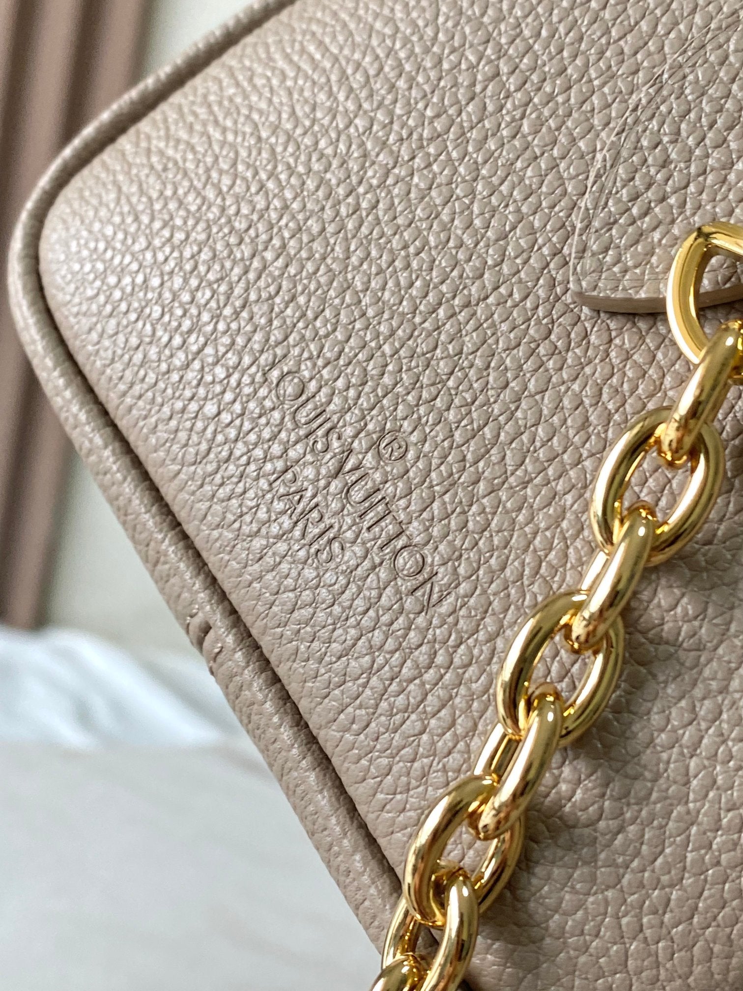 LOUIS VUITTON SPEEDY BANDOULIÈRE 20 IN TAUPE BROWN AND WHITE MONOGRAM EMPREINTE LEATHER