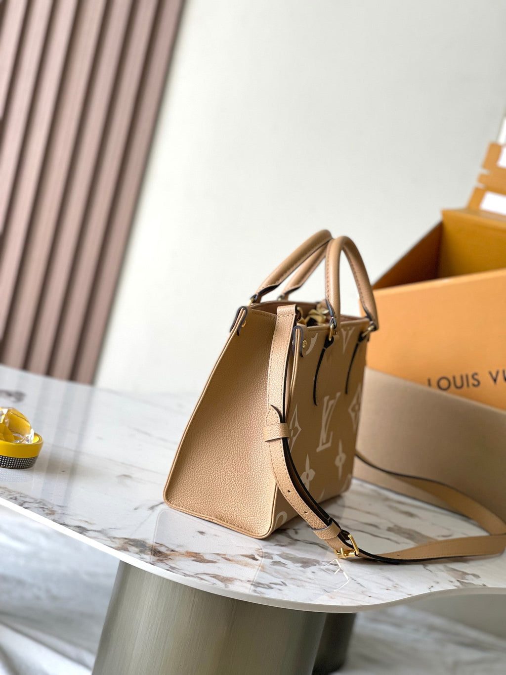 LOUIS VUITTON ONTHEGO PM 25 IN MILK TEA MONOGRAM IMPREINTE LEATHER