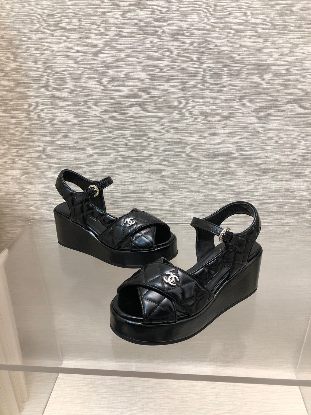 CHANEL WEDGE SANDALS IN BLACK CALFSKIN