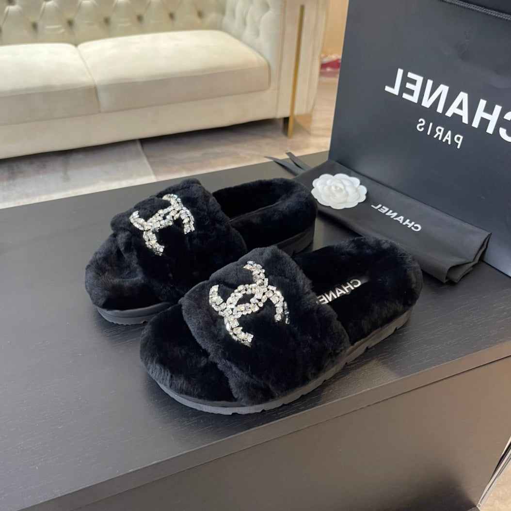 CHANEL SLIPPERS IN BLACK FUR