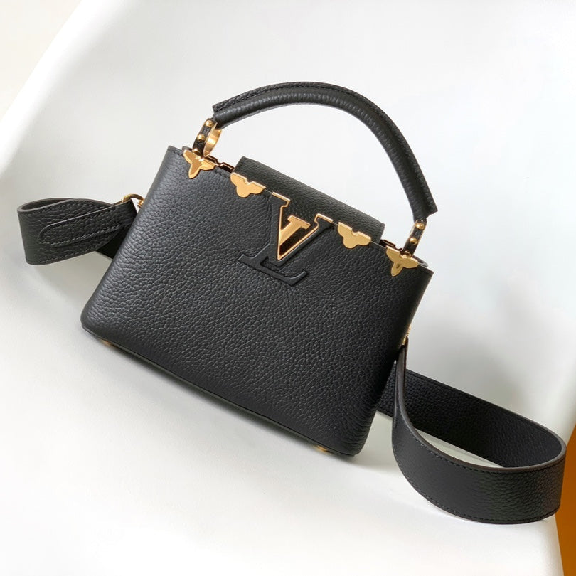 LOUIS VUITTON CAPUCINES MM BAG 21 IN BLACK TAURILLON COWHIDE GOLD HARDWARE