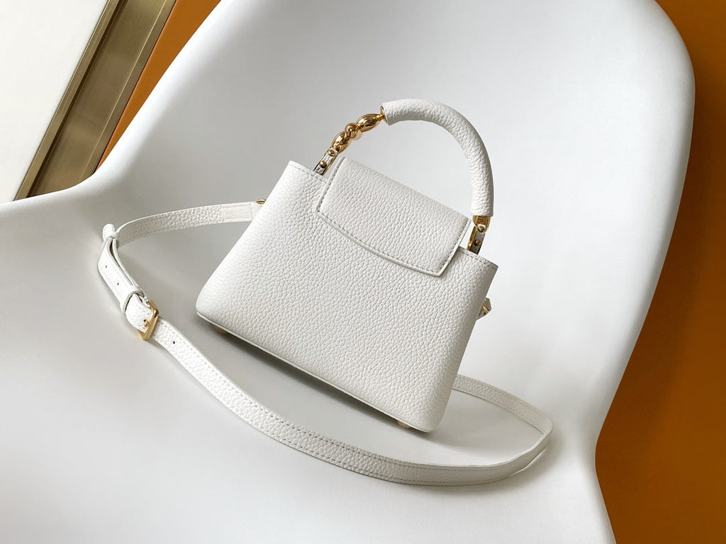 LOUIS VUITTON CAPUCINES EAST-WEST MINI 21 IN WHITE TAURILLON LEATHER GOLD-TONE HARDWARE