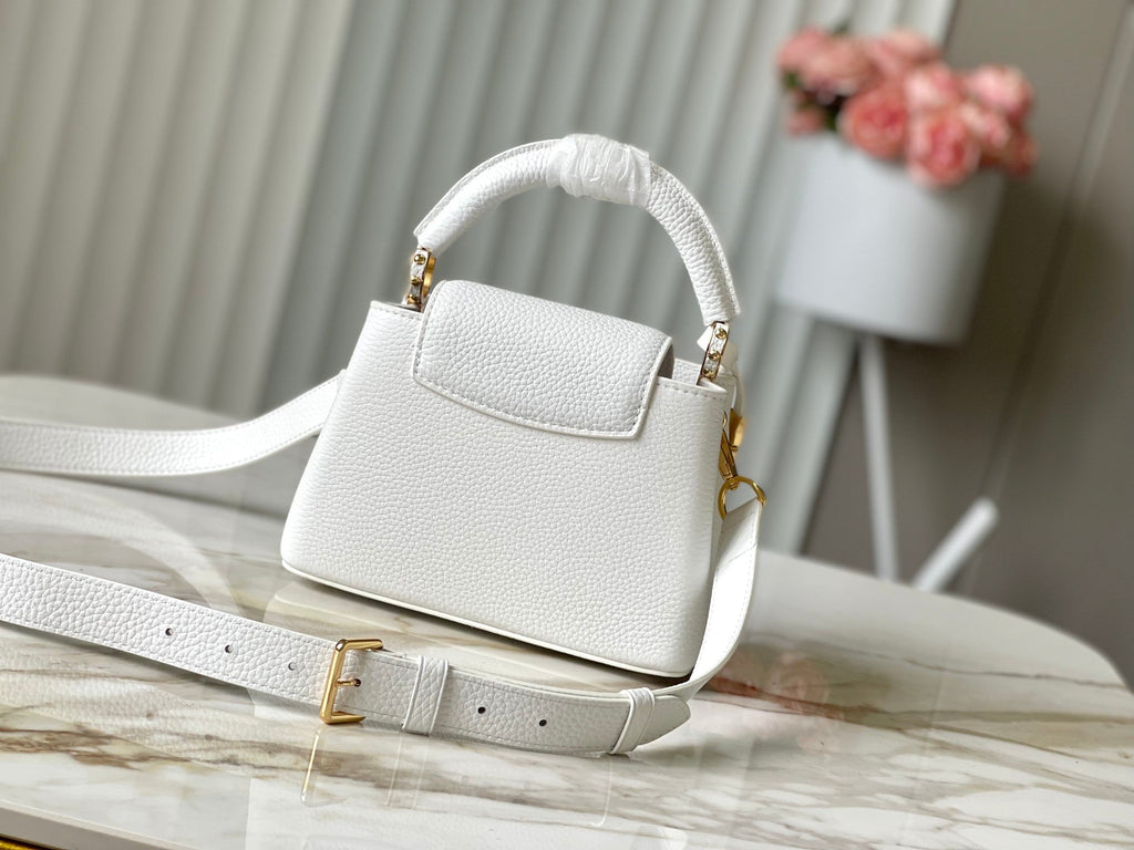 LOUIS VUITTON CAPUCINES MINI 21 IN WHITE TAURILLON GOLD HARDWARE
