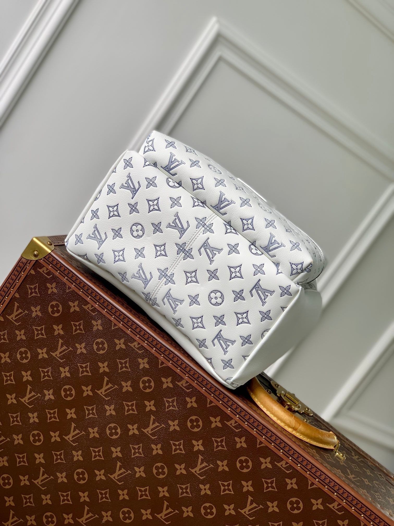 LOUIS VUITTON DISCOVERY PM BACKPACK 38 IN WHITE MONOGRAM LAMBSKIN