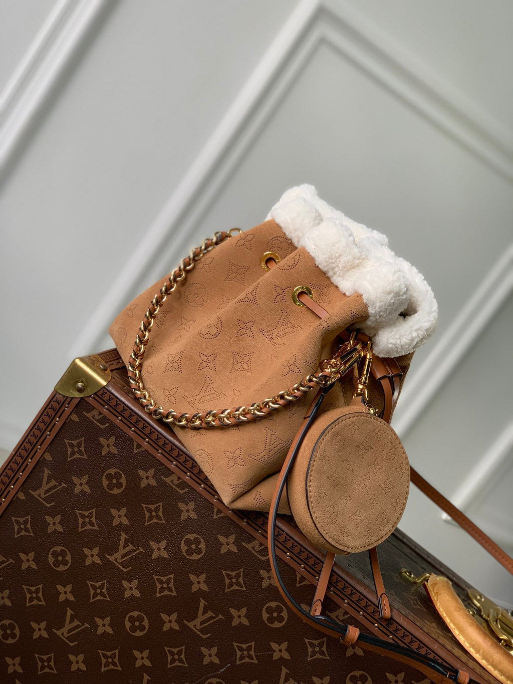 LOUIS VUITTON BELLA 22 IN CINNAMON BROWN MONOGRAM PERFORATED SUEDE AND WHITE SHEARLING TRIM
