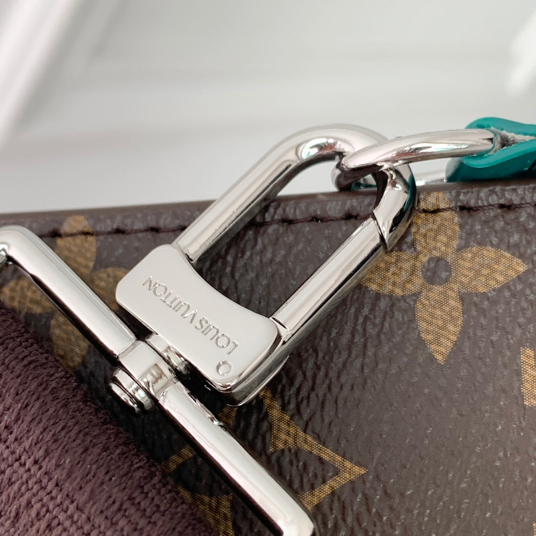 LOUIS VUITTON GASTON WEARABLE WALLET 18 IN BROWN MONOGRAM CANVAS MIX GREEN CALFSKIN