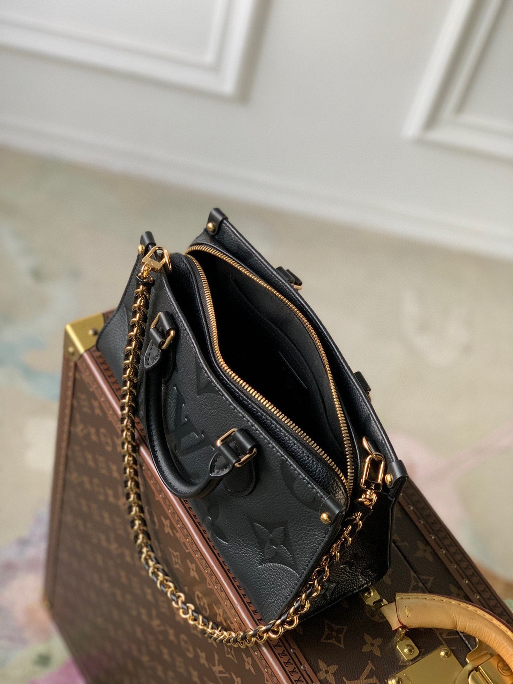 LOUIS VUITTON ONTHEGO EAST WEST BAG 25 IN BLACK MONOGRAM EMBOSSED COWHIDE