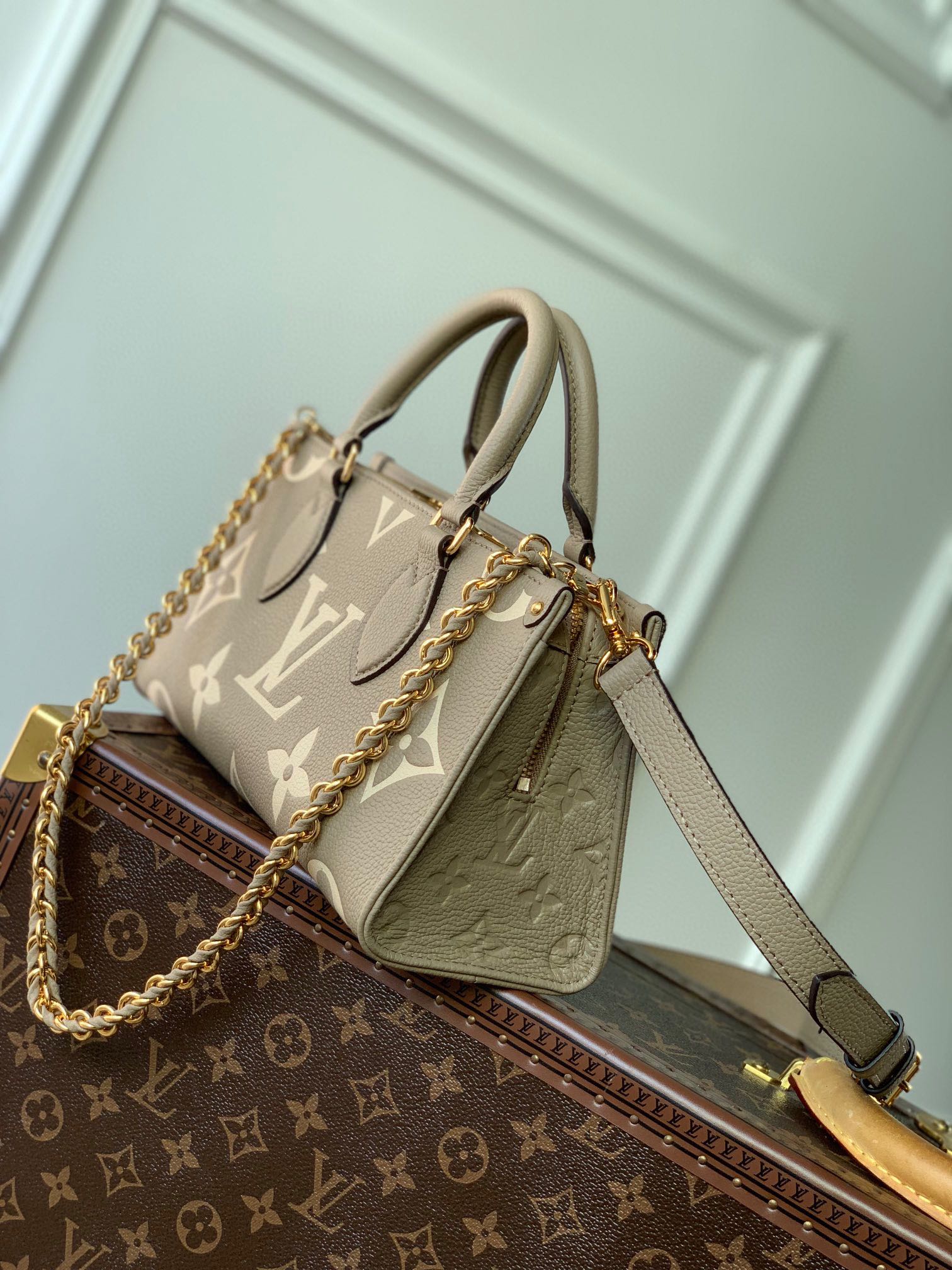 LOUIS VUITTON ONTHEGO EAST WEST BAG 25 IN GREEN MONOGRAM EMBOSSED COWHIDE