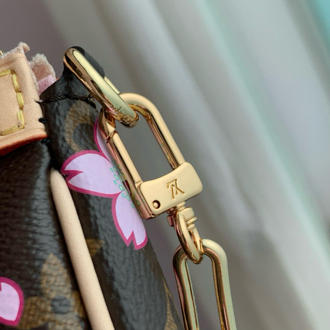 LOUIS VUITTON POCHETTE ACCESSOIRES 22 IN BROWN MONOGRAM CANVAS CHERRY BLOSSOM