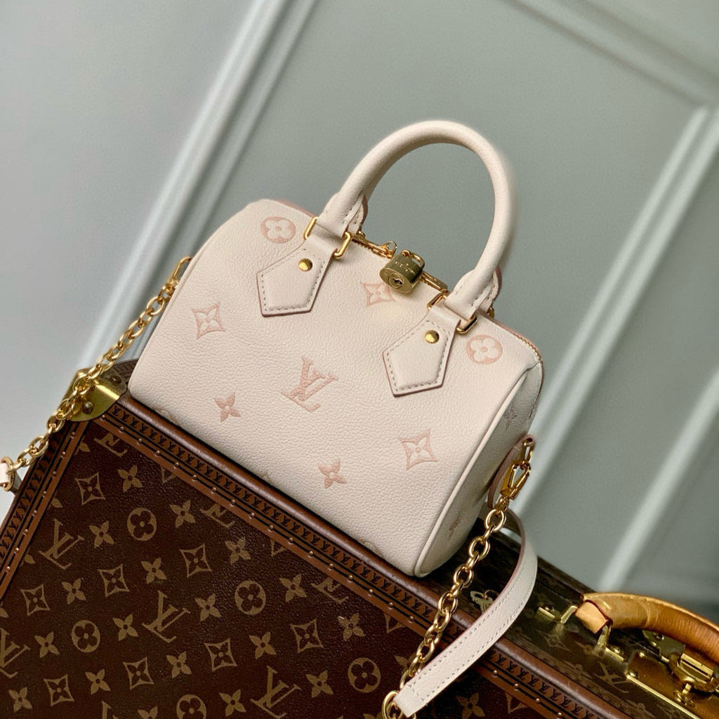 LOUIS VUITTON SPEEDY BANDOULIÈRE 20.5 IN LIGHT PINK MONOGRAM EMPREINTE CANVAS