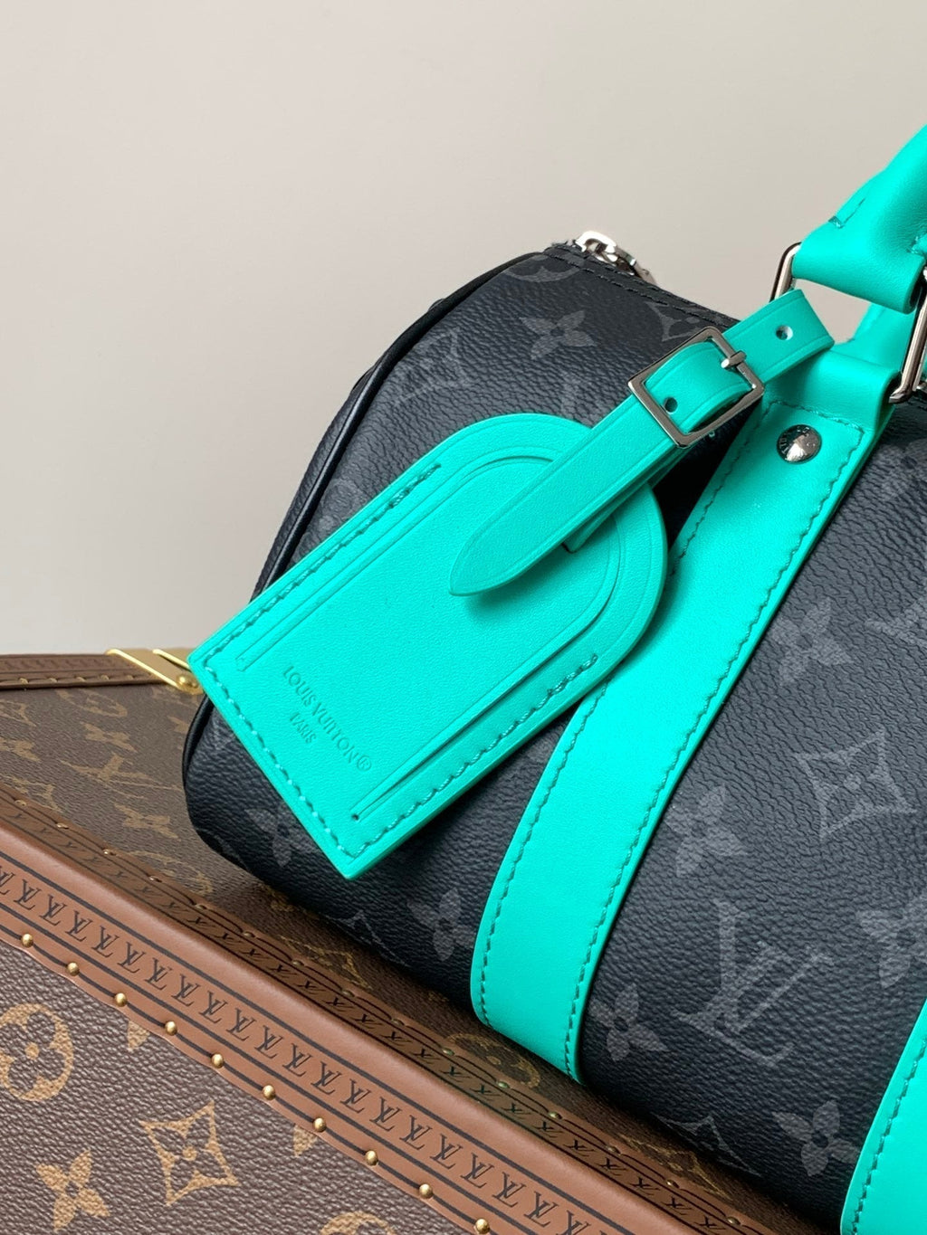 LOUIS VUITTON LV 25S KEEPALL 25 WITH SHOULDER STRAP IN BLACK AQUA COATED MONOGRAM ECLIPSE CANVAS AND CALFSKIN