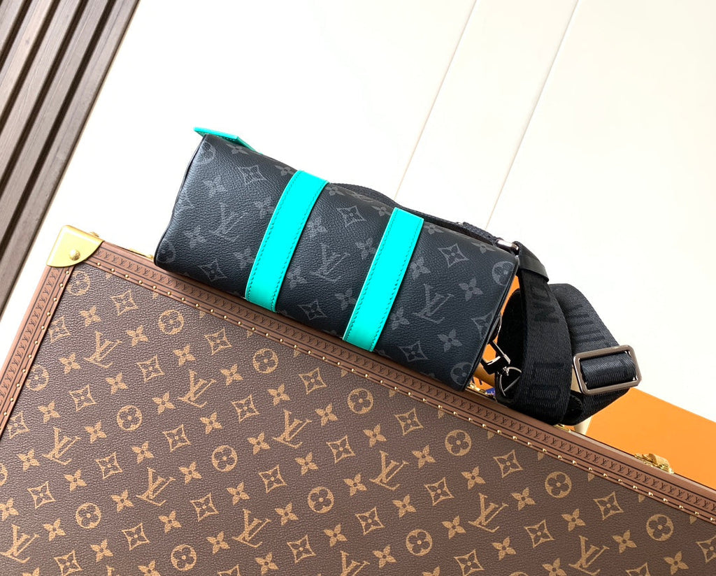 LOUIS VUITTON LV 25S KEEPALL 25 WITH SHOULDER STRAP IN BLACK AQUA COATED MONOGRAM ECLIPSE CANVAS AND CALFSKIN
