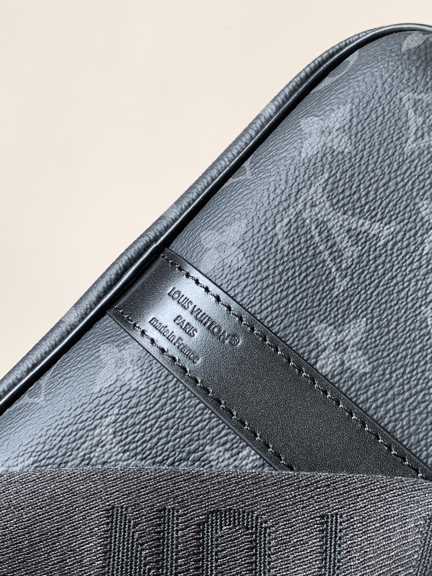 LOUIS VUITTON LV 25S KEEPALL 45 WITH SHOULDER STRAP IN BLACK ORANGE COATED MONOGRAM ECLIPSE CANVAS AND CALFSKIN
