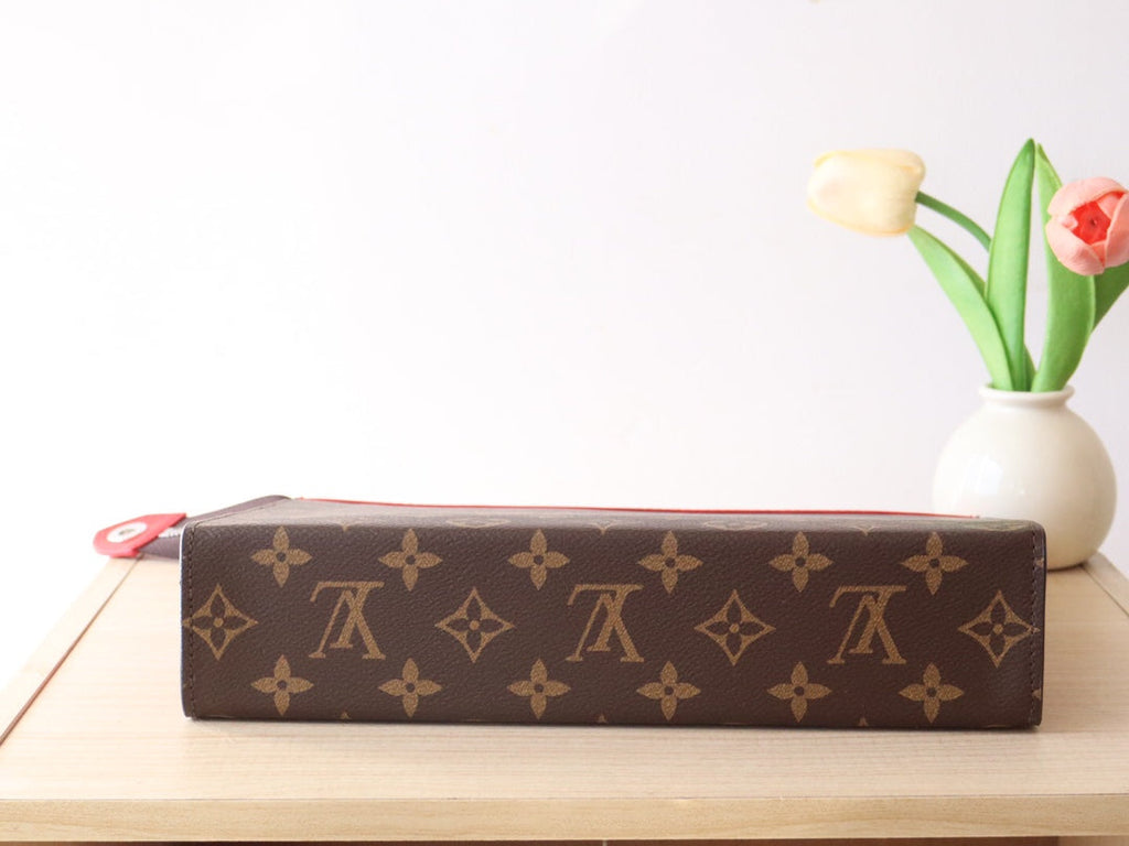 LOUIS VUITTON LV 25S POCHETTE VOYAGE 26 IN SARI RED MONOGRAM MACASSAR COATED CANVAS