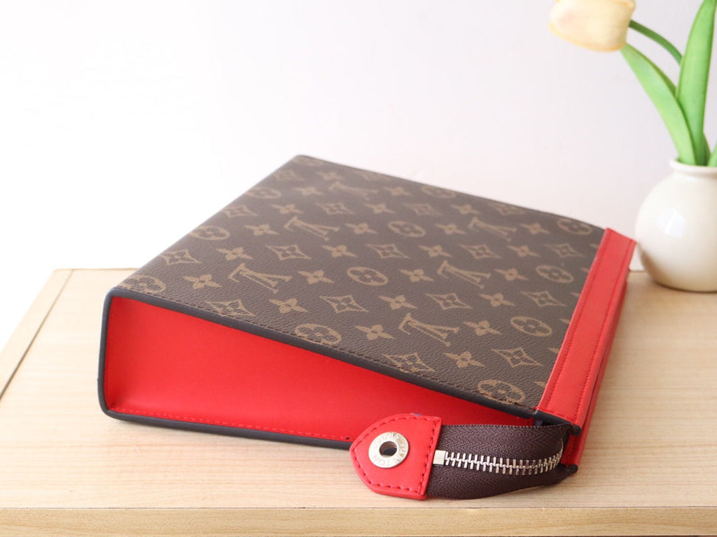 LOUIS VUITTON LV 25S POCHETTE VOYAGE 26 IN SARI RED MONOGRAM MACASSAR COATED CANVAS