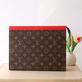 LOUIS VUITTON LV 25S POCHETTE VOYAGE 26 IN SARI RED MONOGRAM MACASSAR COATED CANVAS