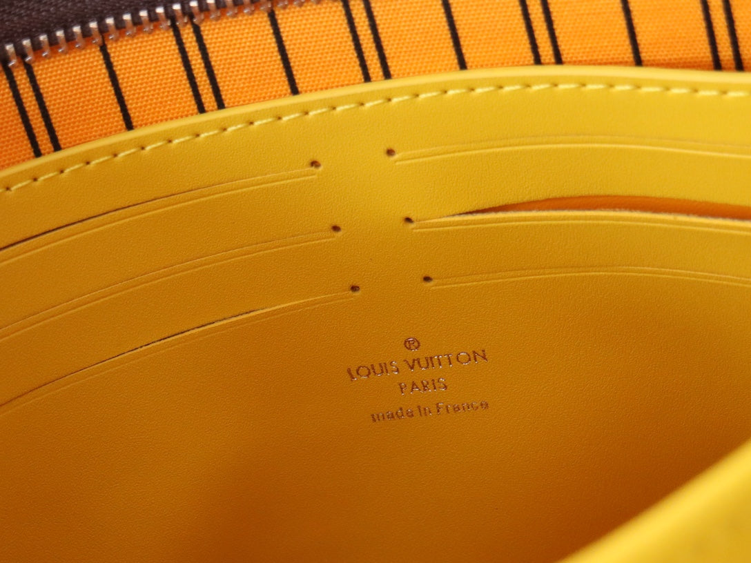 LOUIS VUITTON LV 25S POCHETTE VOYAGE 26 IN YELLOW MONOGRAM MACASSAR COATED CANVAS