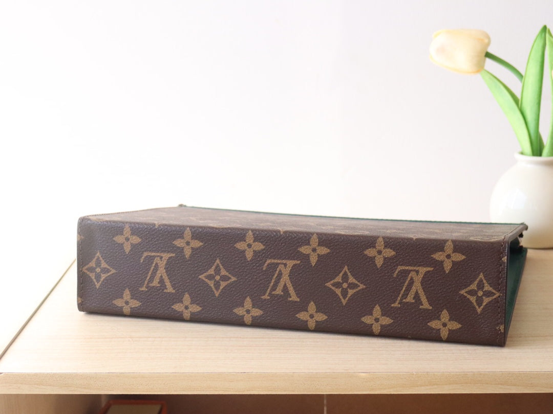 LOUIS VUITTON LV 25S POCHETTE VOYAGE 26 IN BORNEO GREEN MONOGRAM MACASSAR COATED CANVAS