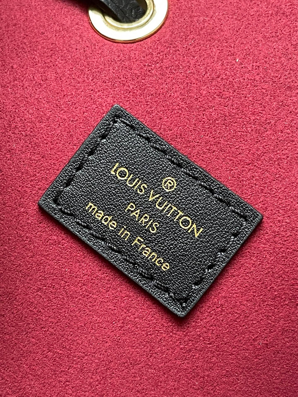 LOUIS VUITTON CRAFTY NEONOE 26 IN BLACK AND CREAM BICOLOR EMPREINTE CALFSKIN