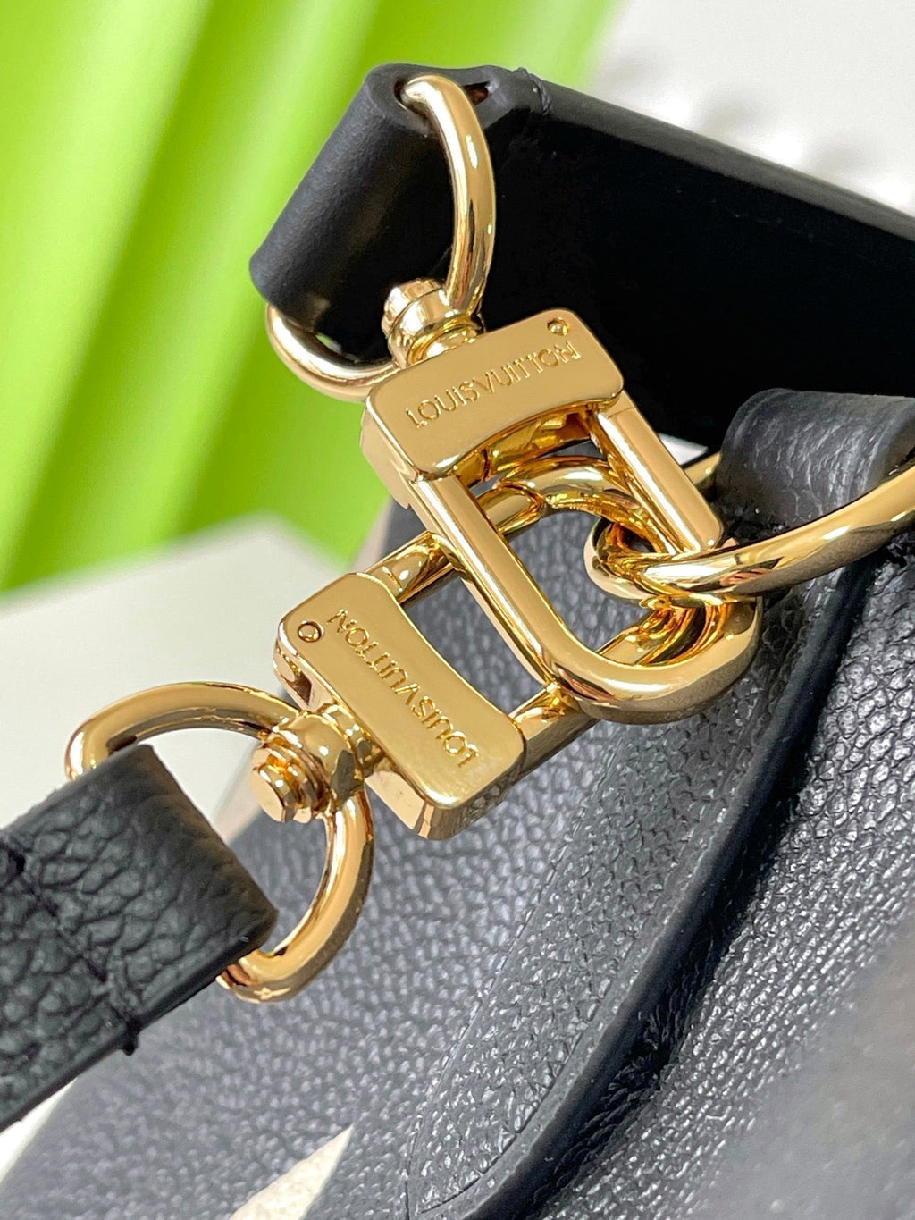 LOUIS VUITTON CRAFTY NEONOE 26 IN BLACK AND CREAM BICOLOR EMPREINTE CALFSKIN
