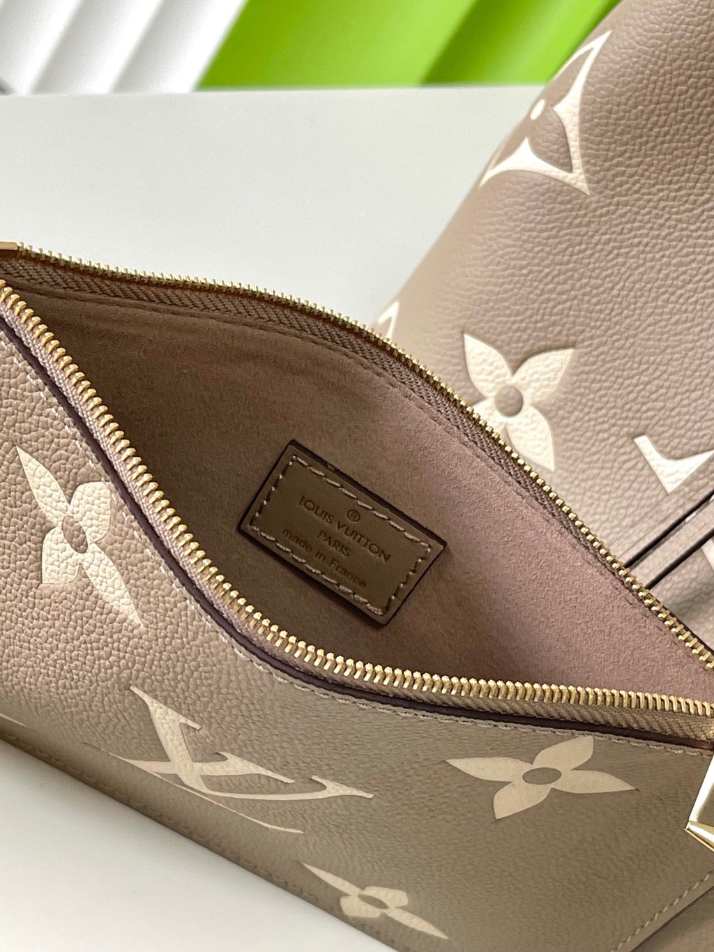 LOUIS VUITTON CRAFTY NEONOE 26 IN BROWN AND CREAM BICOLOR EMPREINTE CALFSKIN