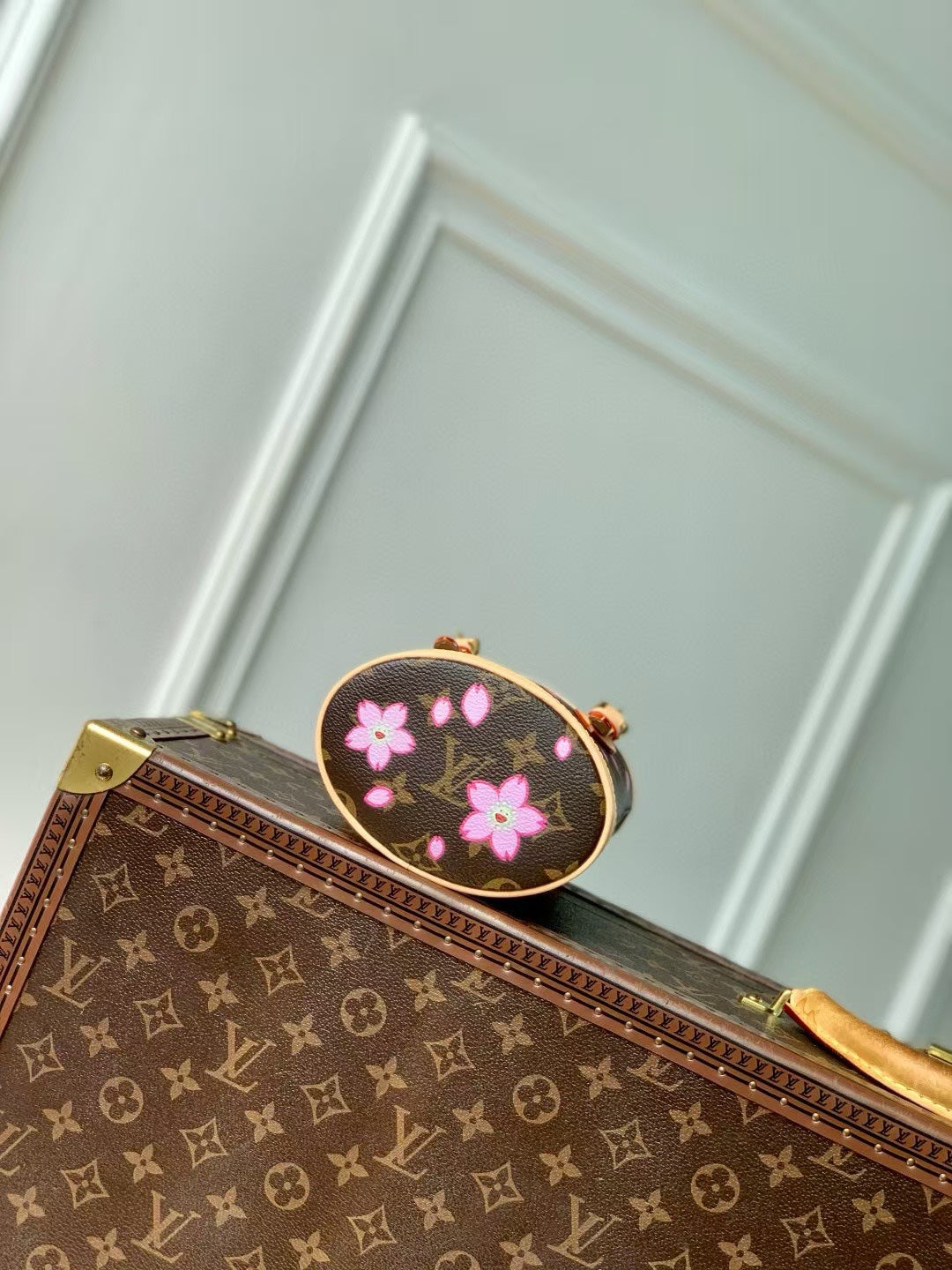 LOUIS VUITTON NANO BUCKET CHERRY BLOSSOM IN SAKURA BROWN MONOGRAM COATED CANVAS