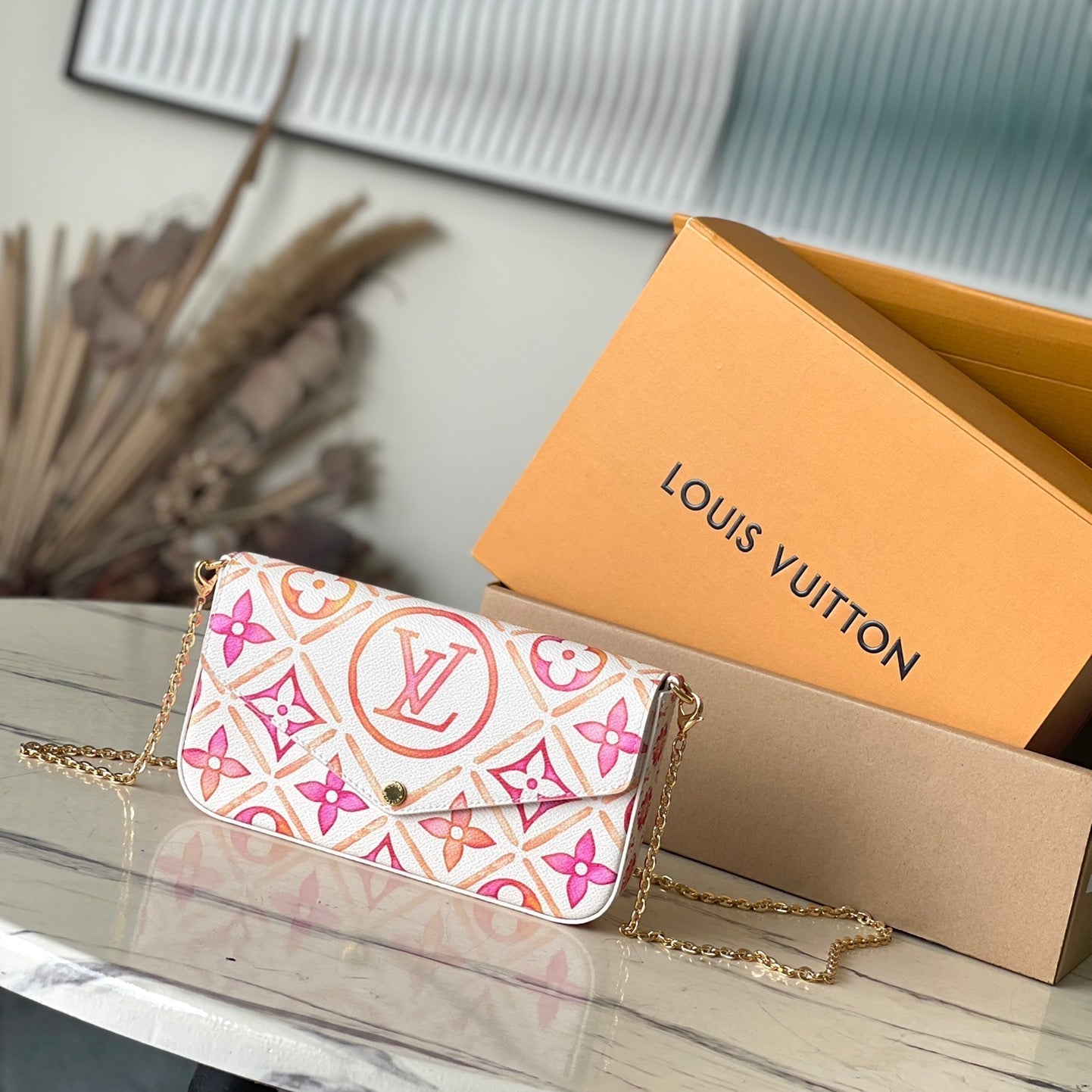 LOUIS VUITTON FÉLICIE POCHETTE 21 IN CORAL MONOGRAM TILES CANVAS