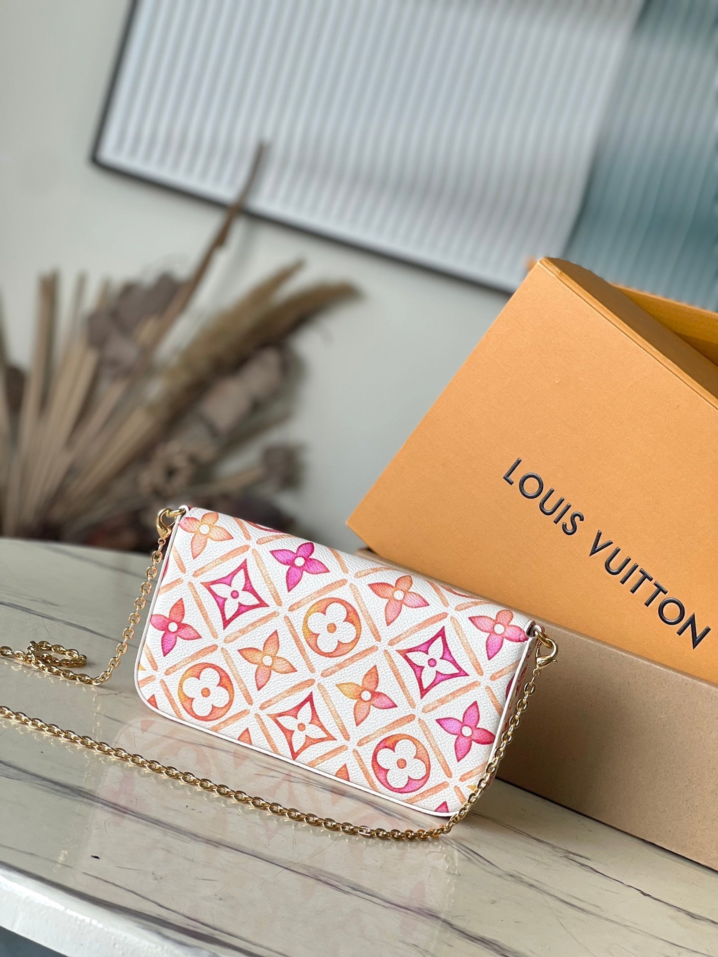 LOUIS VUITTON FÉLICIE POCHETTE 21 IN CORAL MONOGRAM TILES CANVAS