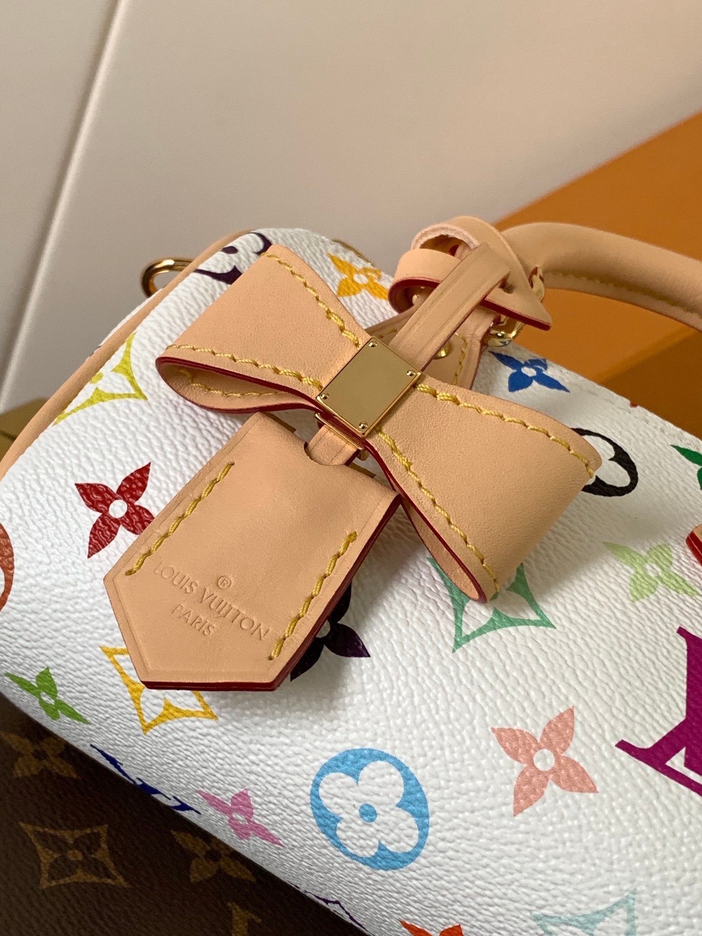 LOUIS VUITTON NANO SPEEDY BAG 16 IN COLORFUL MONOGRAM PATTERN AND WHITE COATED CANVAS