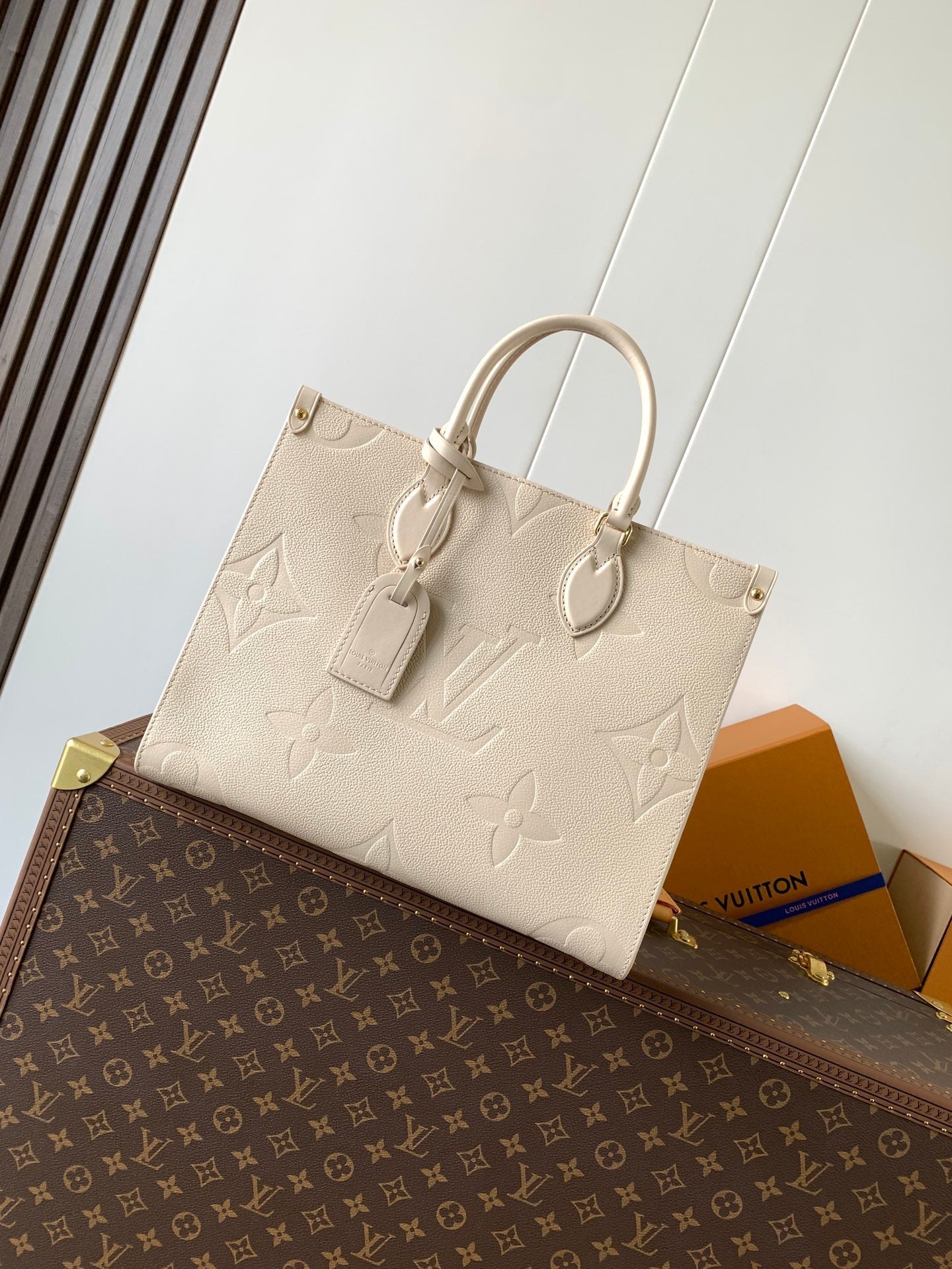 LOUIS VUITTON ONTHEGO 35 IN LIGHT BEIGE MONOGRAM CALFSKIN
