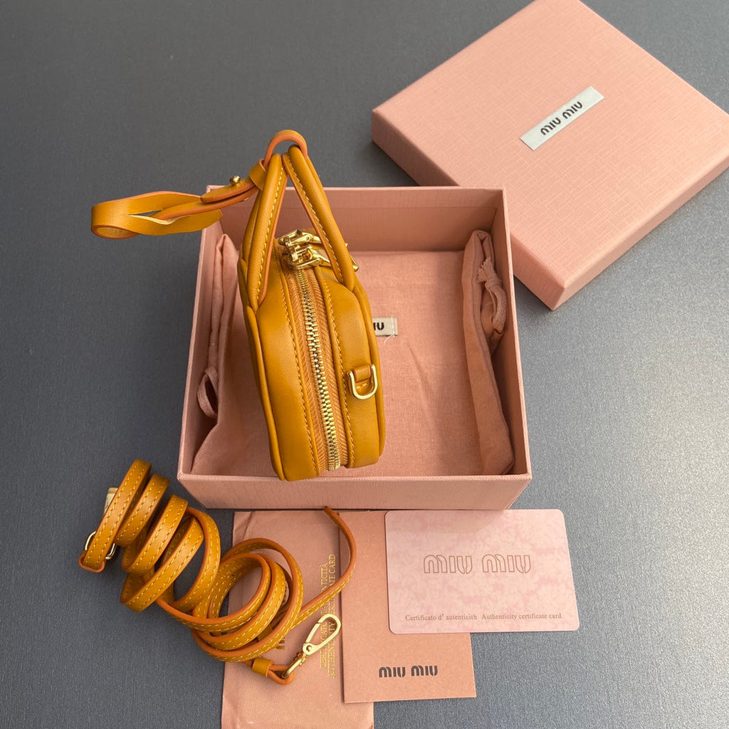 MICRO BAG KEYCHAIN 11 IN INDOCHINE ORANGE CALFSKIN EMBOSSED LOGO