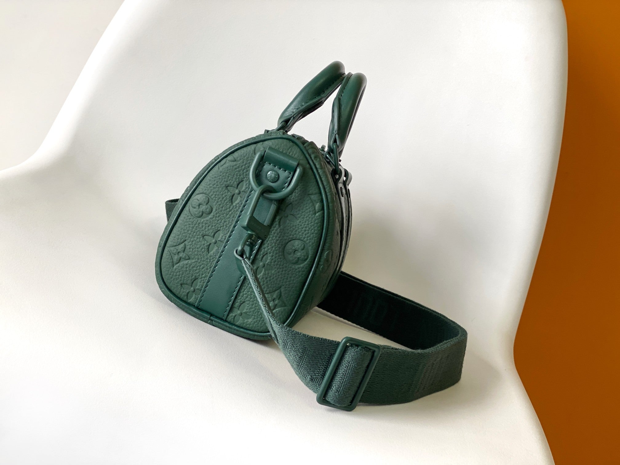 LOUIS VUITTON KEEPALL BANDOULIÈRE 25 IN FOREST GREEN MONOGRAM EMBOSSED CALFSKIN