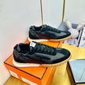 HERMES JET SNEAKER IN BLACK CALFSKIN AND SUEDE