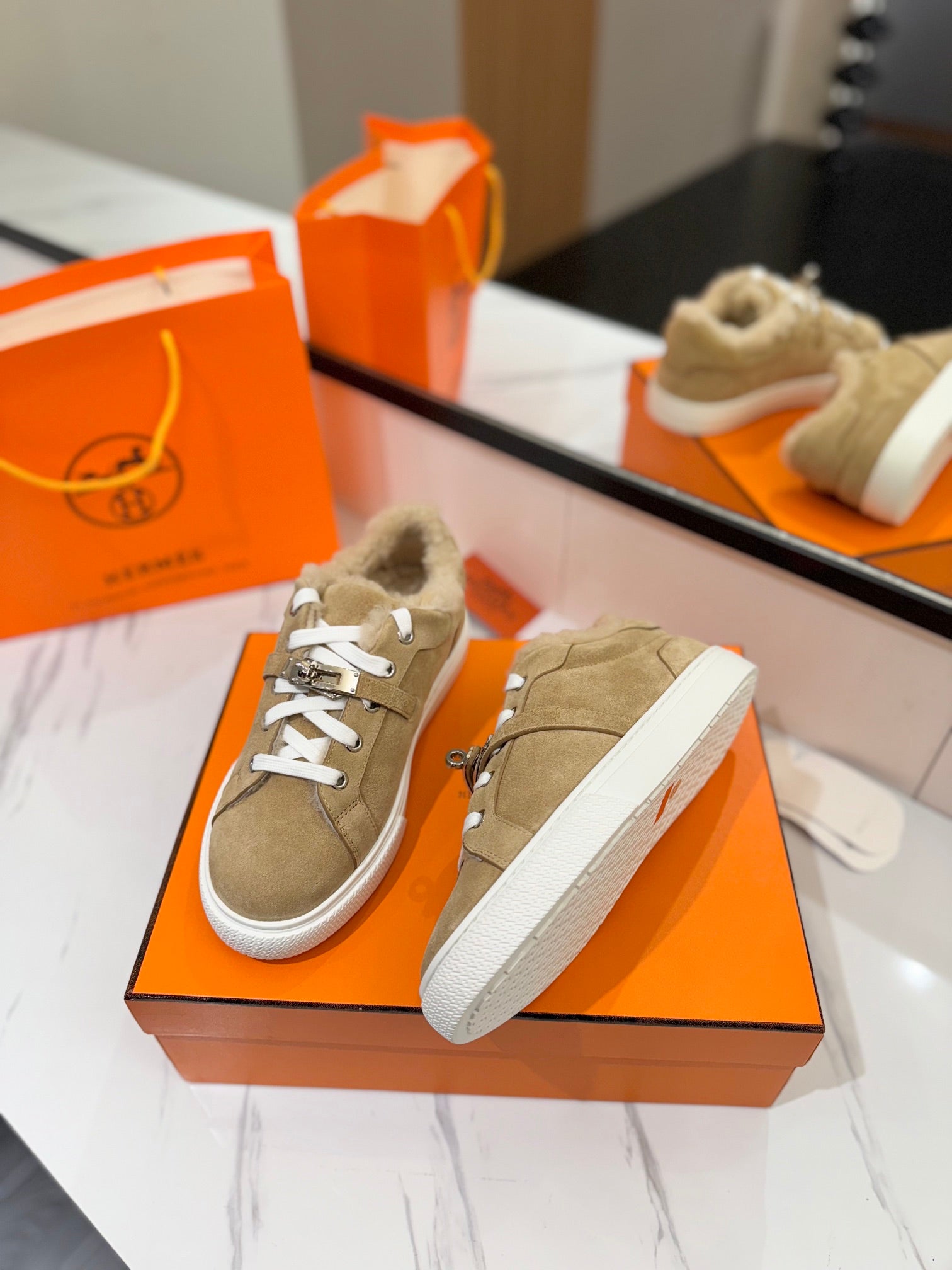 HERMES DAY SNEAKER IN TORTILLA BROWN SUEDE AND FLEECE LINING
