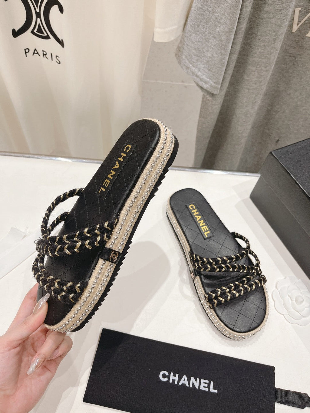 CHANEL WOVEN STRAP SLIPPERS IN BLACK LAMBSKIN